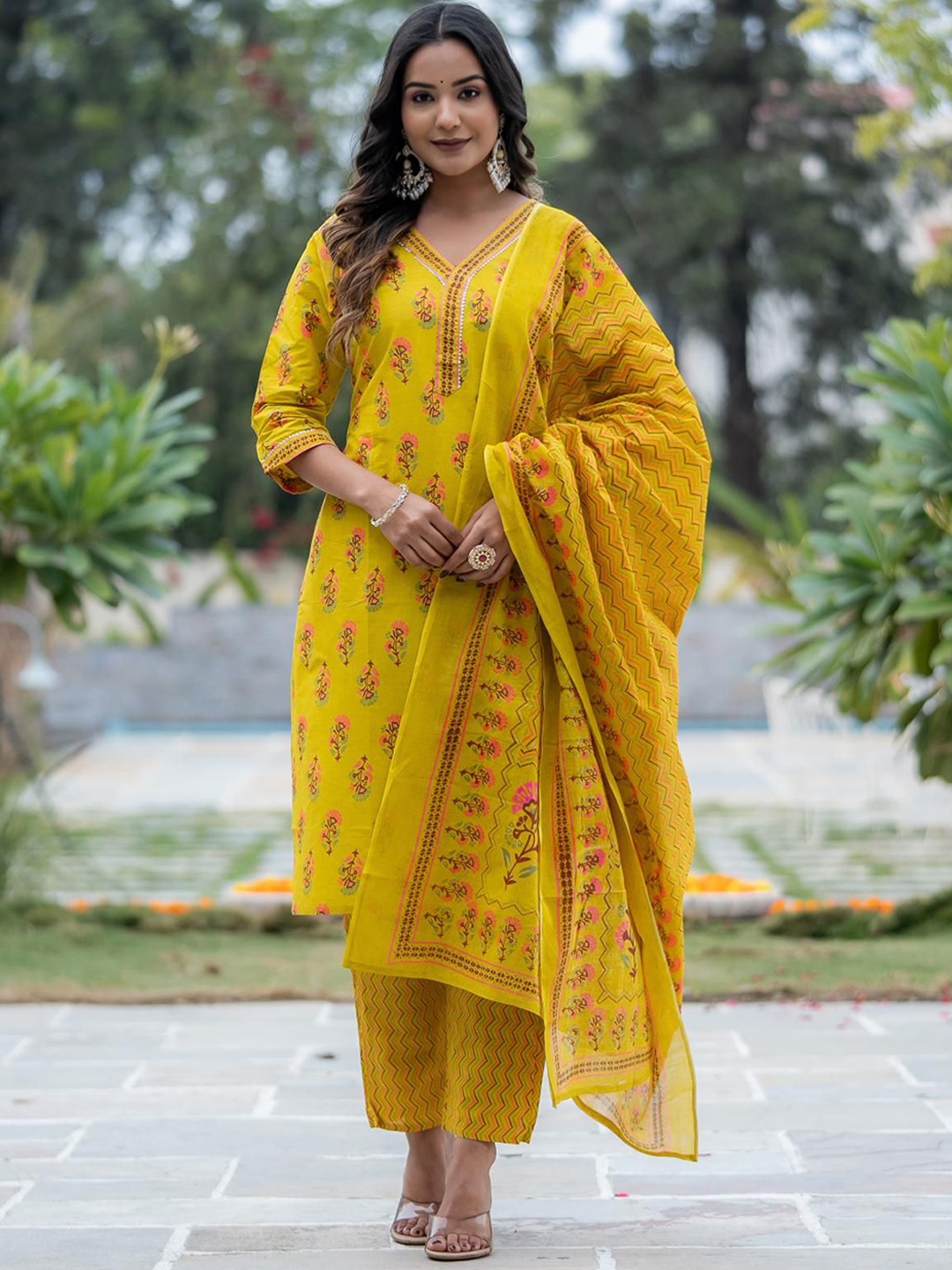 

Moda Rapido Yellow Floral Printed V-Neck Raw Silk Straight Kurta With Trousers And Dupatta