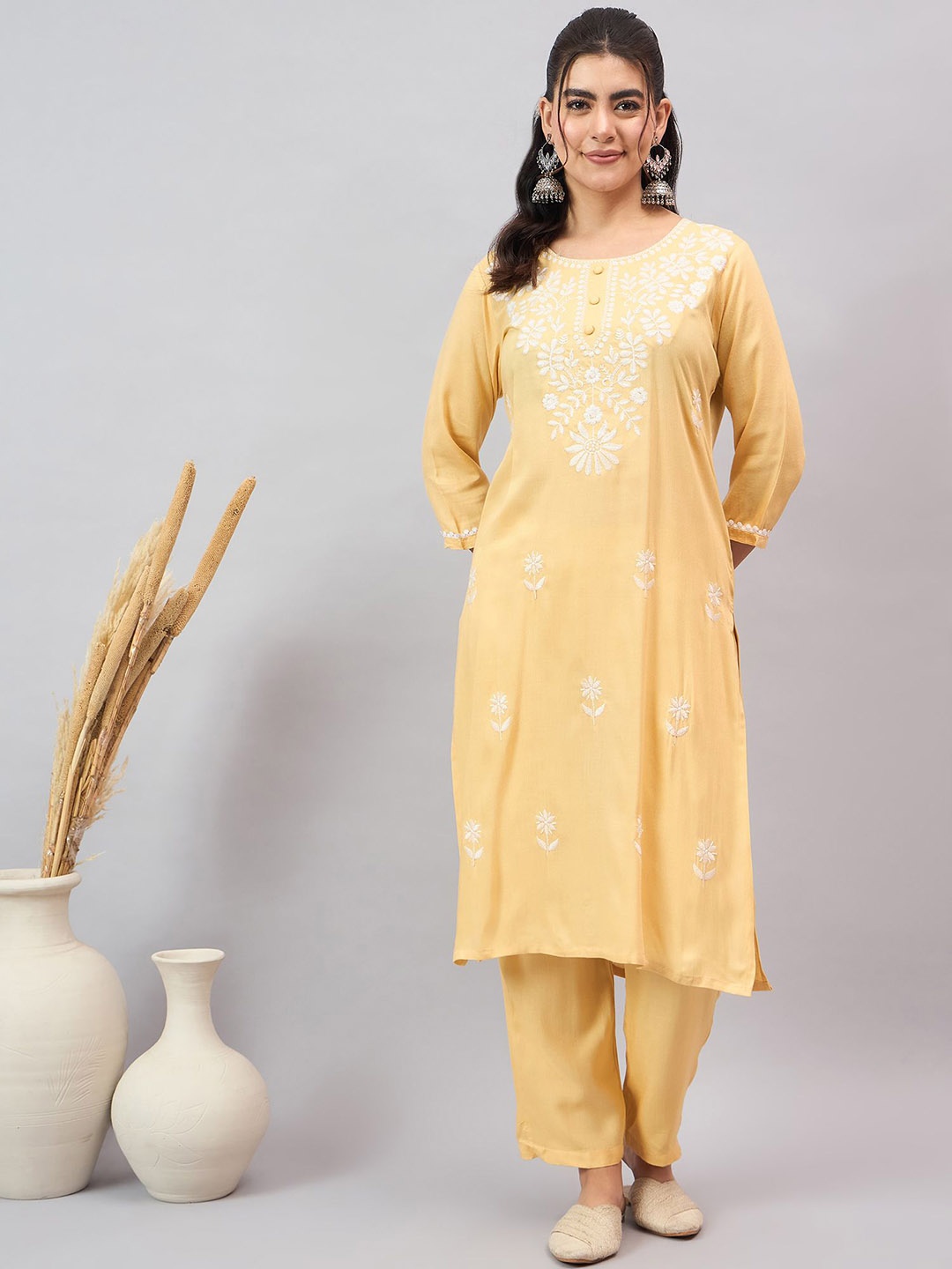 

Anouk Yellow Ethnic Motifs Embroidered Round Neck Kurta With Trouser