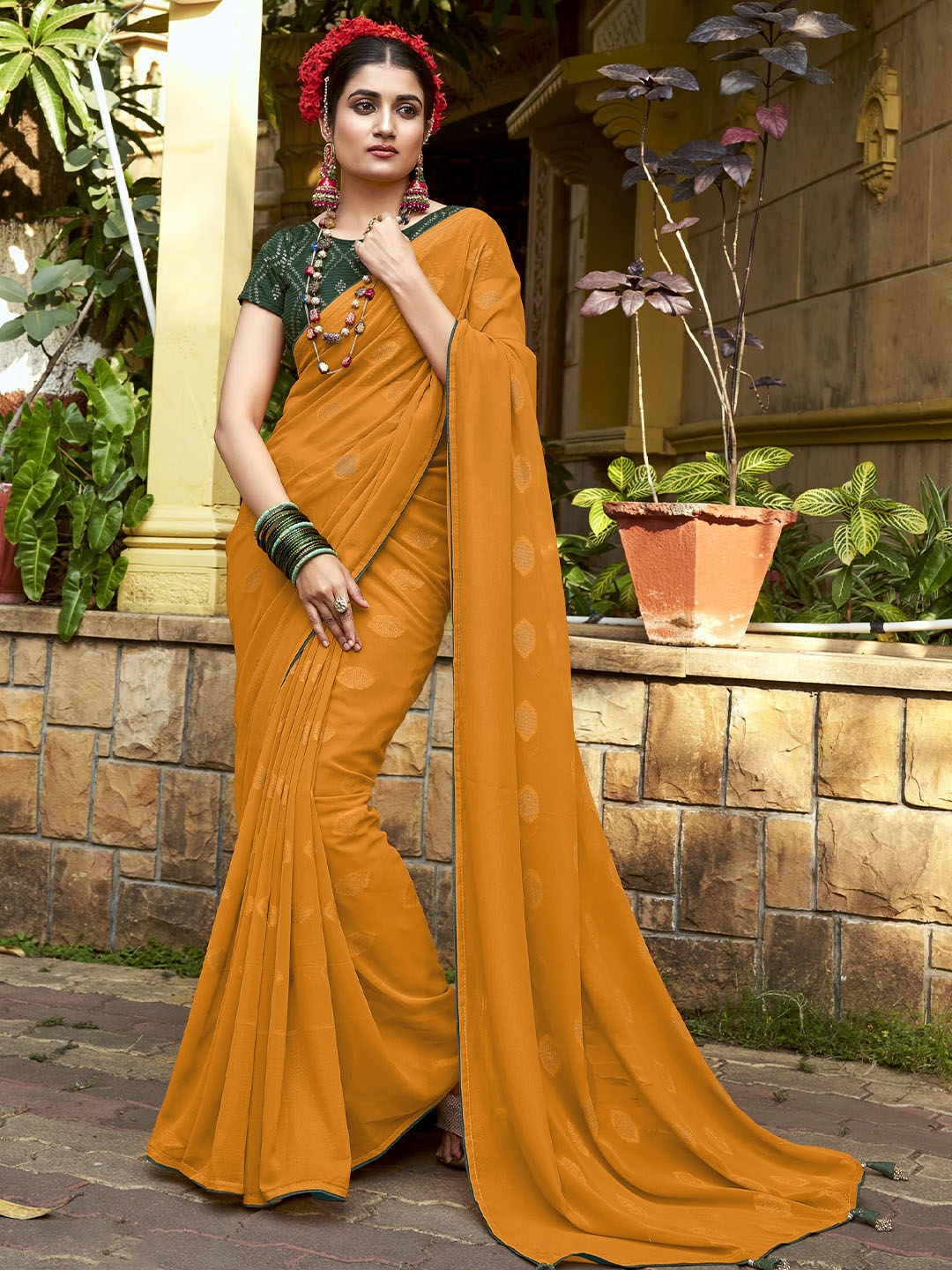 

A.V.M. SILK MILLS Woven Design Pure Georgette Saree, Mustard