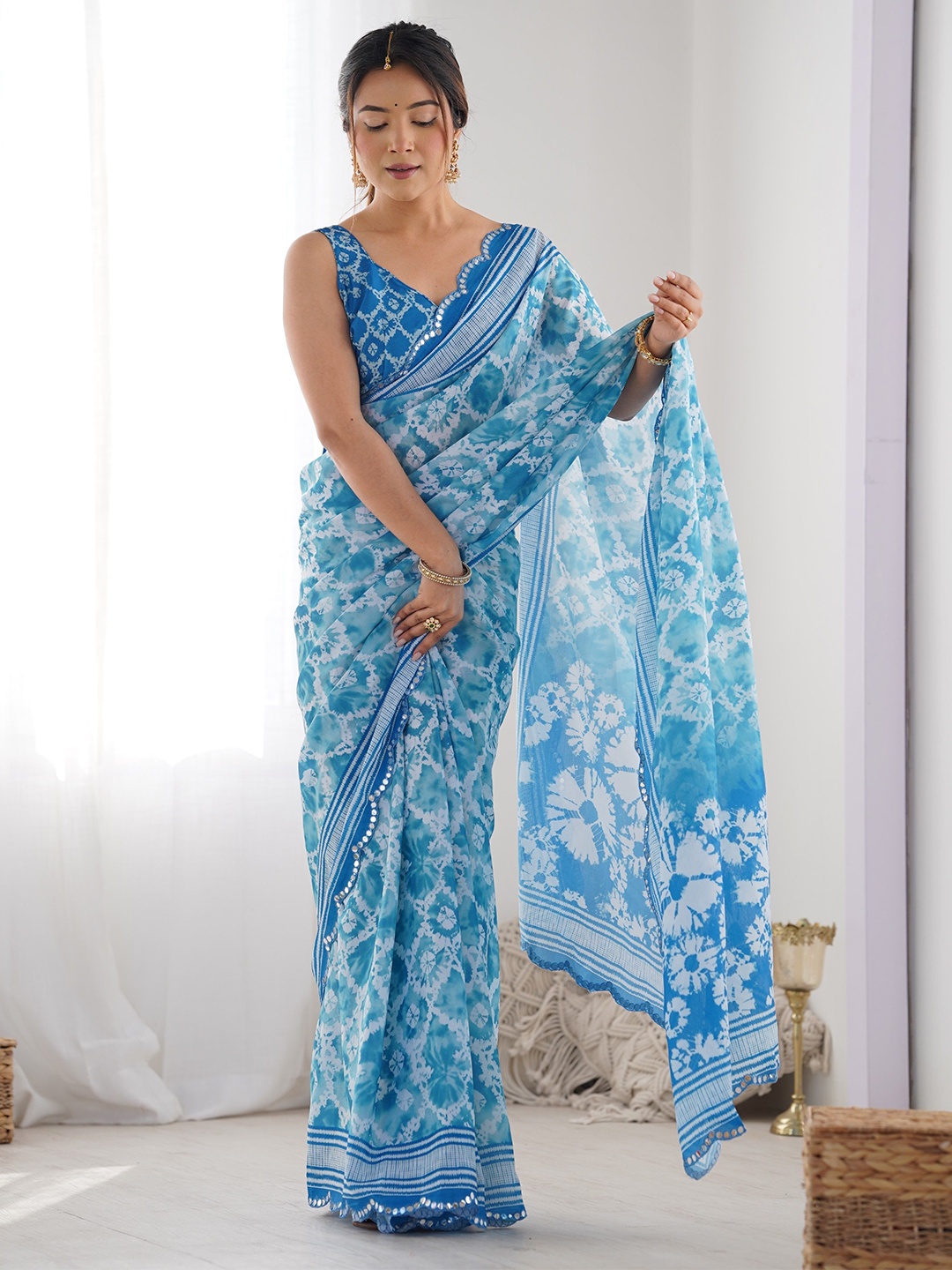 

Moda Rapido Women Abstract Printed Saree With Mirror Work Border, Blue