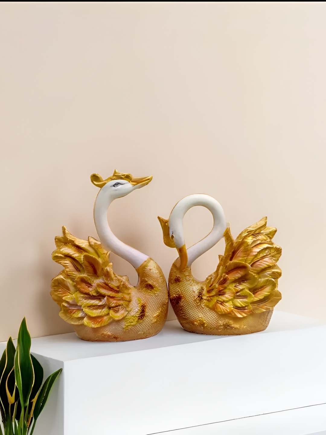 

Vrinban International Gold-Toned Figurine Showpiece