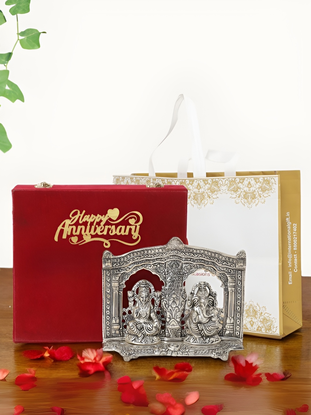 

INTERNATIONAL GIFT Silver-Toned Laxmi Ganesh Religious Idol Showpiece