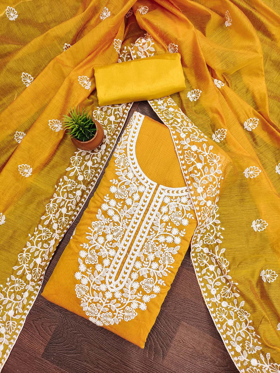 

HERE&NOW Floral Embroidered Thread Work Chanderi Cotton Unstitched Dress Material, Yellow