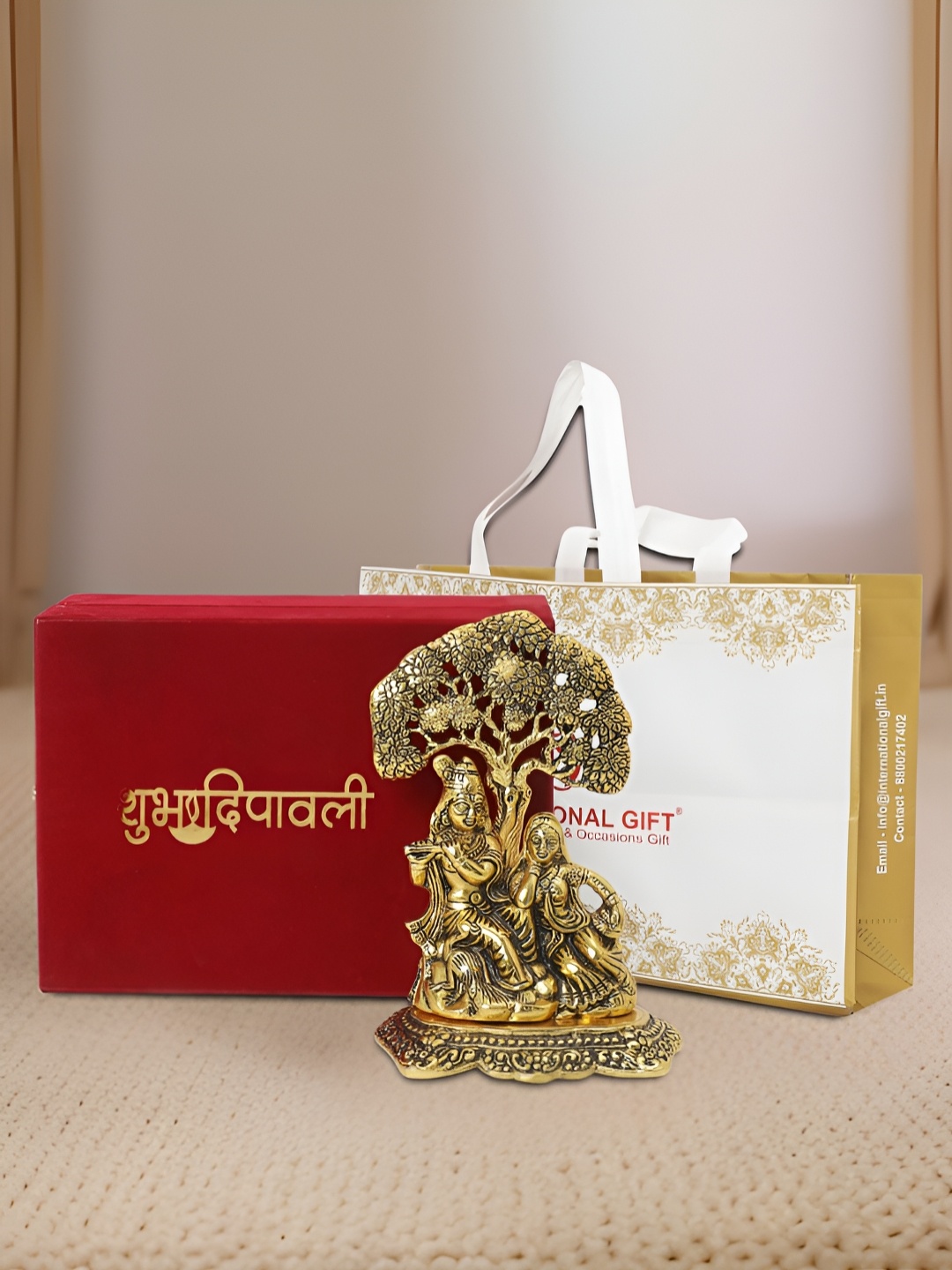 

INTERNATIONAL GIFT Gold-Toned God And Goddess Radha Krishna Religious Idol Showpiece