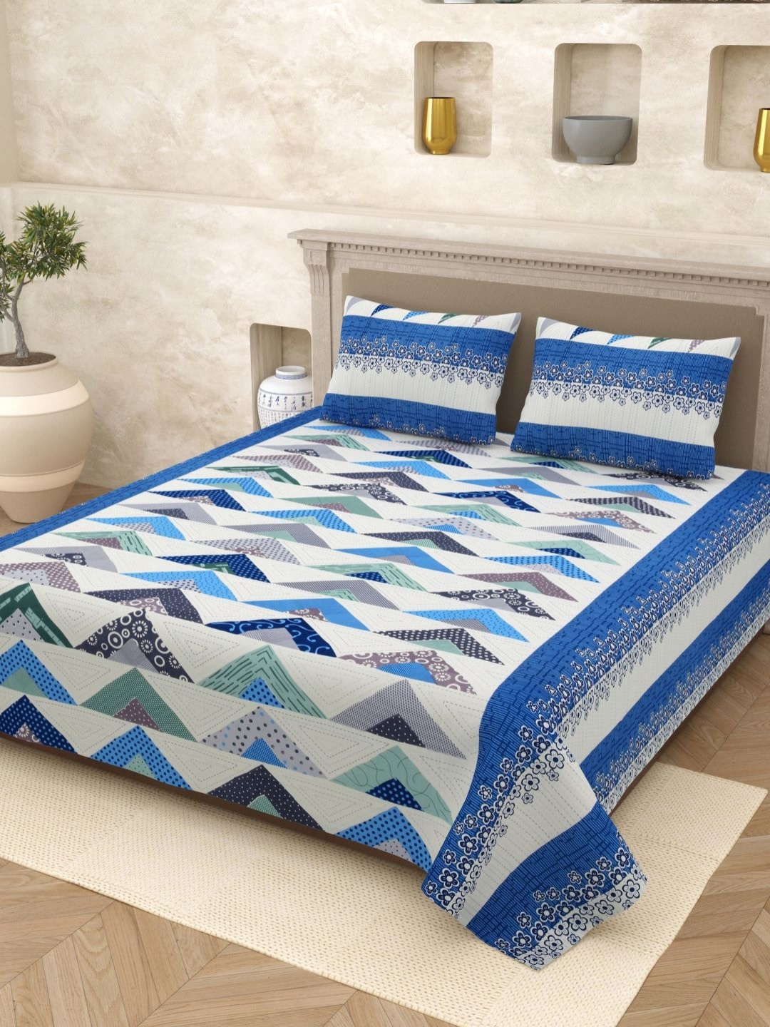 

Myntra Elegant Homes White Printed Pure Cotton 210 TC Queen Bedsheet Set 2.65m x 2.20m, Blue