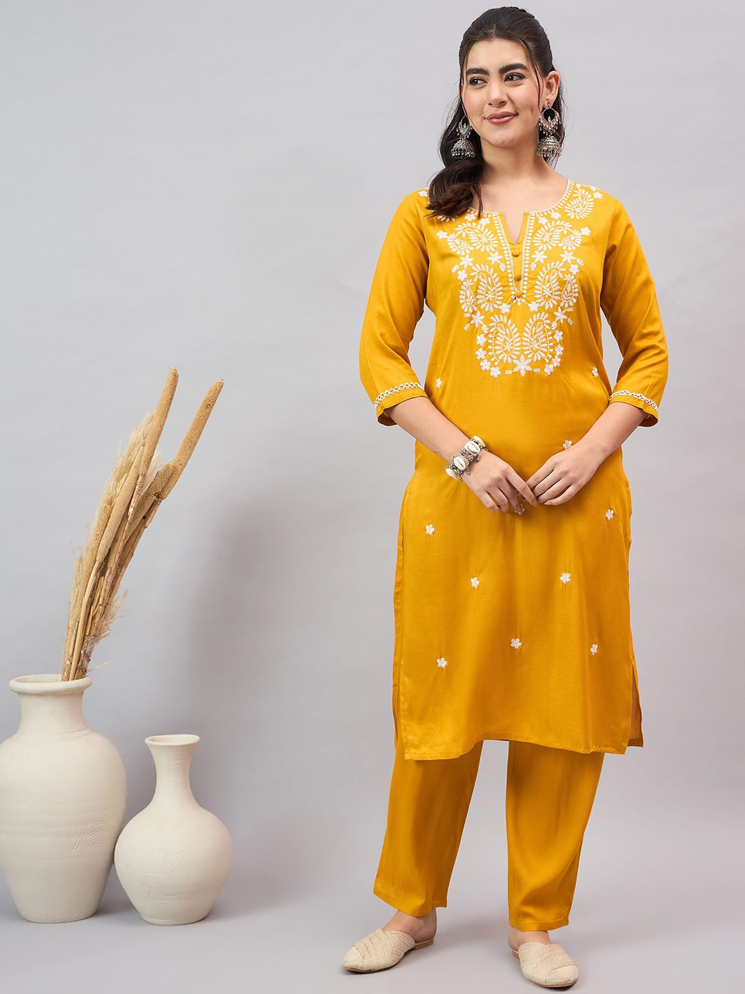 

Anouk Mustard Paisley Embroidered Notch-Neck Straight Kurta With Trouser