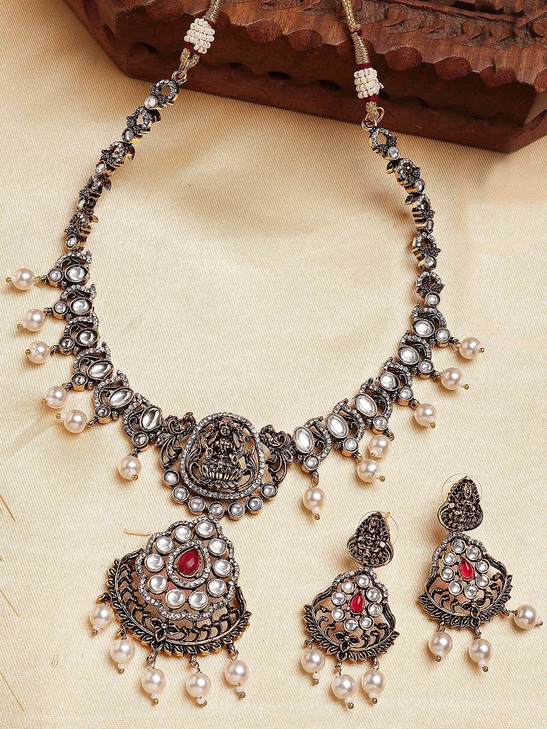 

KARATCART Gold Plated Stone Studded Temple Necklace and Earrings