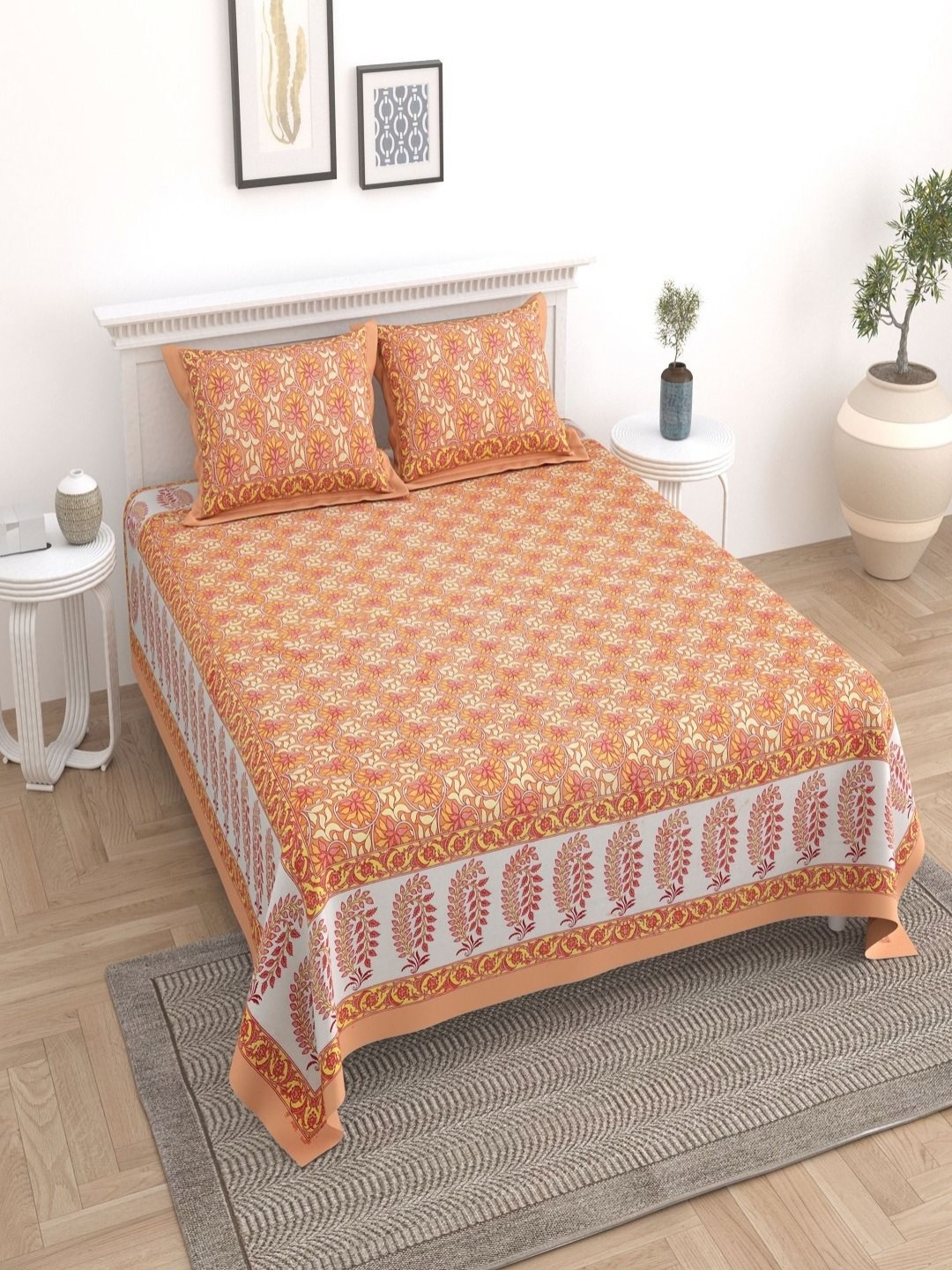 

Myntra Elegant Homes Orange Printed Cotton 180 TC King Bedsheet Set 2.74 m x 2.54 m