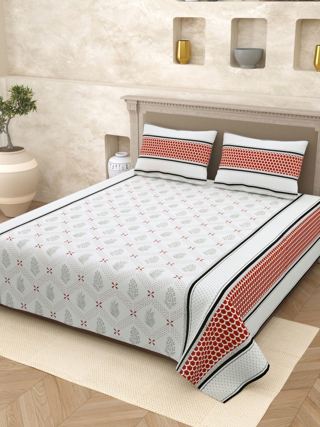 

Myntra Elegant Homes White Printed Cotton 210TC King Bedsheet Set 2.65m x 2.20m