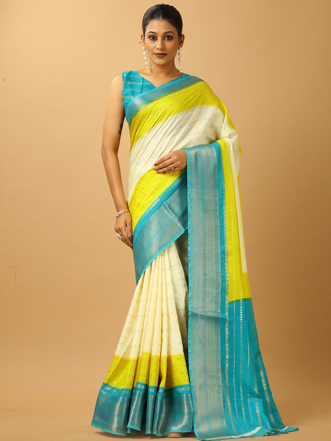 

NIRMAL CREATION Colourblocked Zari Art Silk Saree, Turquoise blue