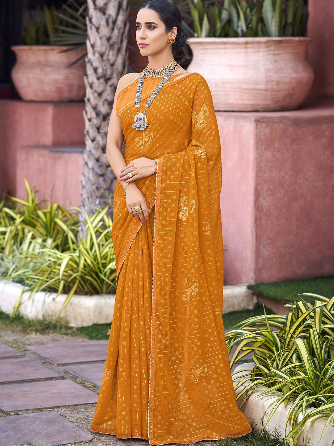 

A.V.M. SILK MILLS Woven Design Gotta Patti Pure Georgette Saree, Mustard