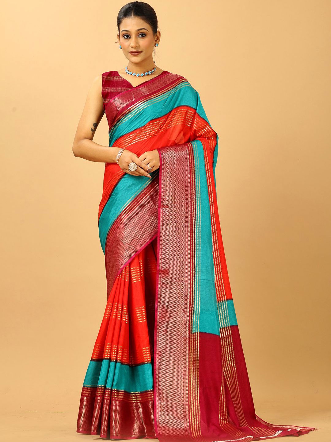 

NIRMAL CREATION Striped Zari Saree, Maroon