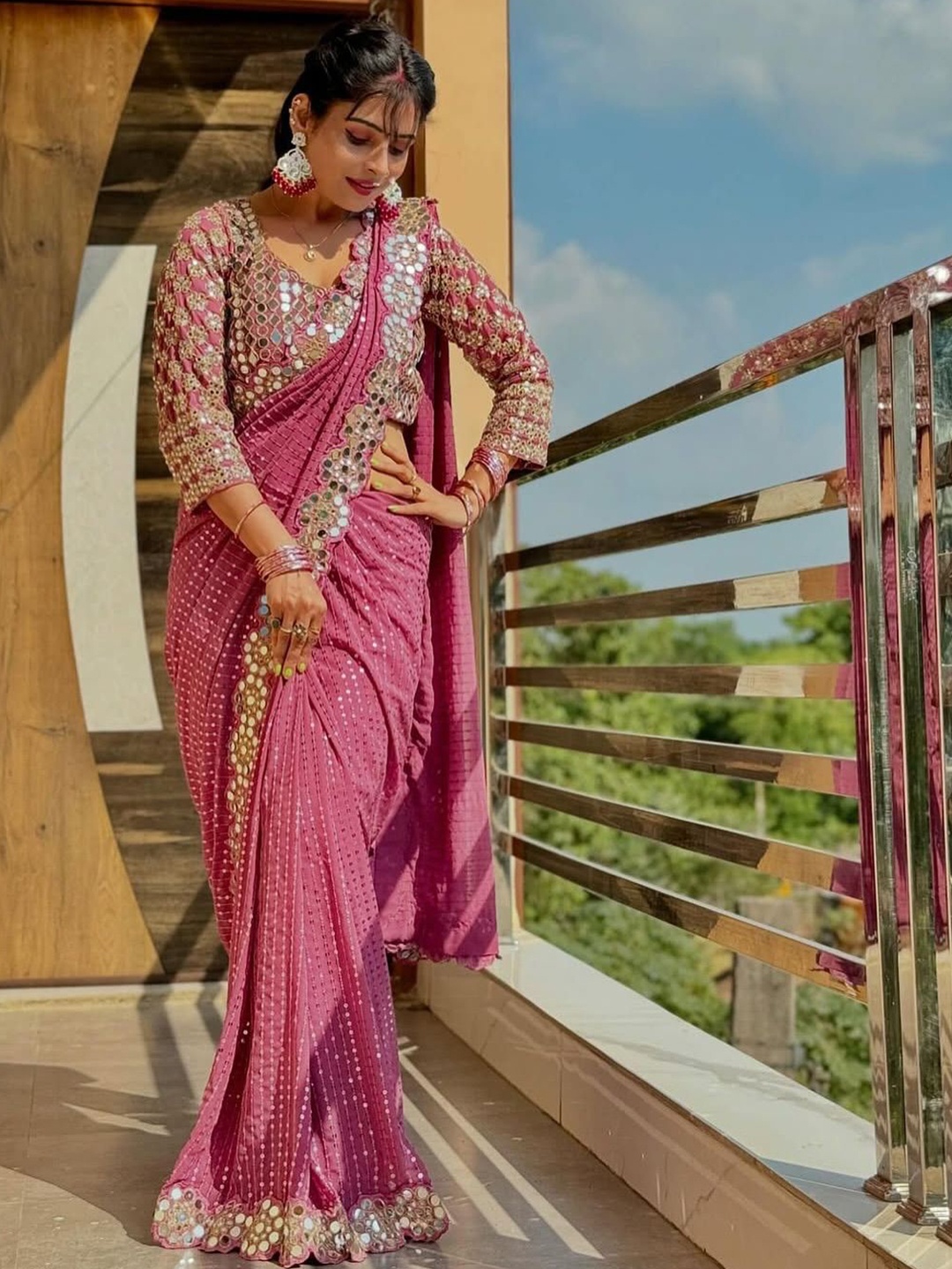 

Celeb Styles Embellished Sequinned Mirror Work Heavy Work Pure Georgette Saree, Pink