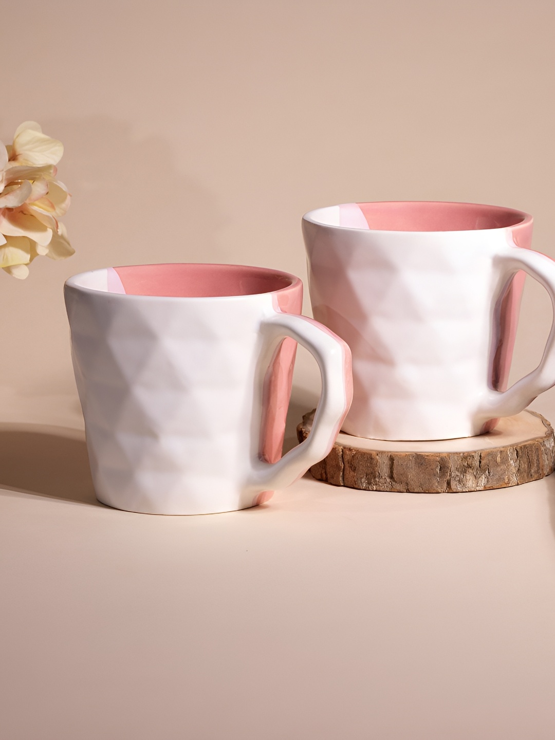 

Storepedia White & Peach-Coloured 2 Pieces Textured Ceramic Glossy Cups 150 ml Each