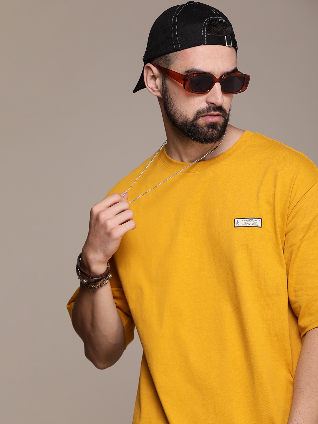 

The Roadster Life Co. Pure Cotton Solid Drop-Shoulder Sleeves Casual T-shirt, Yellow