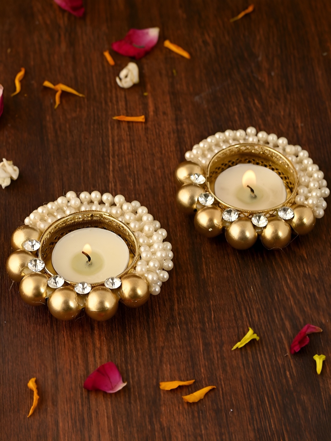 

Myntra Elegant Homes Gold-Toned & White 2 Pieces Tea Lights Ensemble Candle Holders