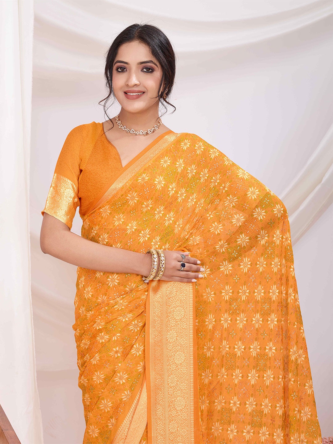 

Mitera Woven Design Zari Pure Chiffon Ikat Saree, Yellow