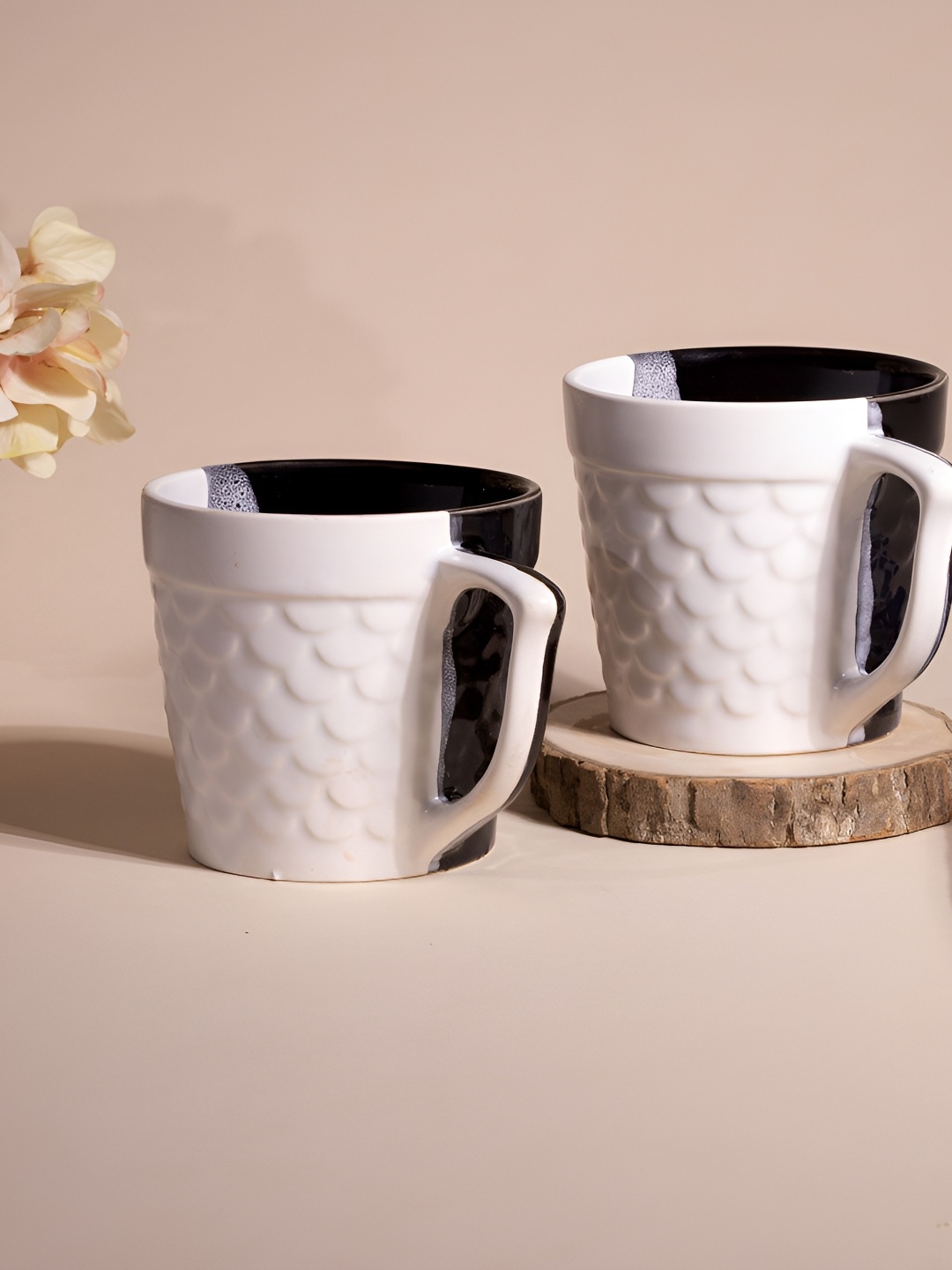 

Storepedia Black & White 2 Pieces Textured Ceramic Glossy Cups 150 ml Each