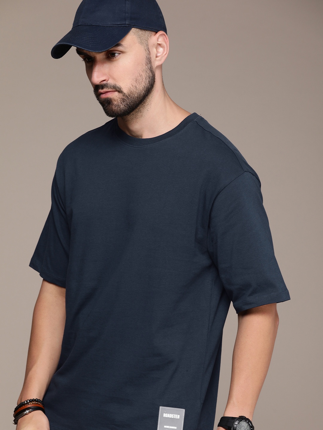 

The Roadster Lifestyle Co. Oversized Fit Solid Drop-Shoulder Sleeves Pure Cotton T-shirt, Navy blue