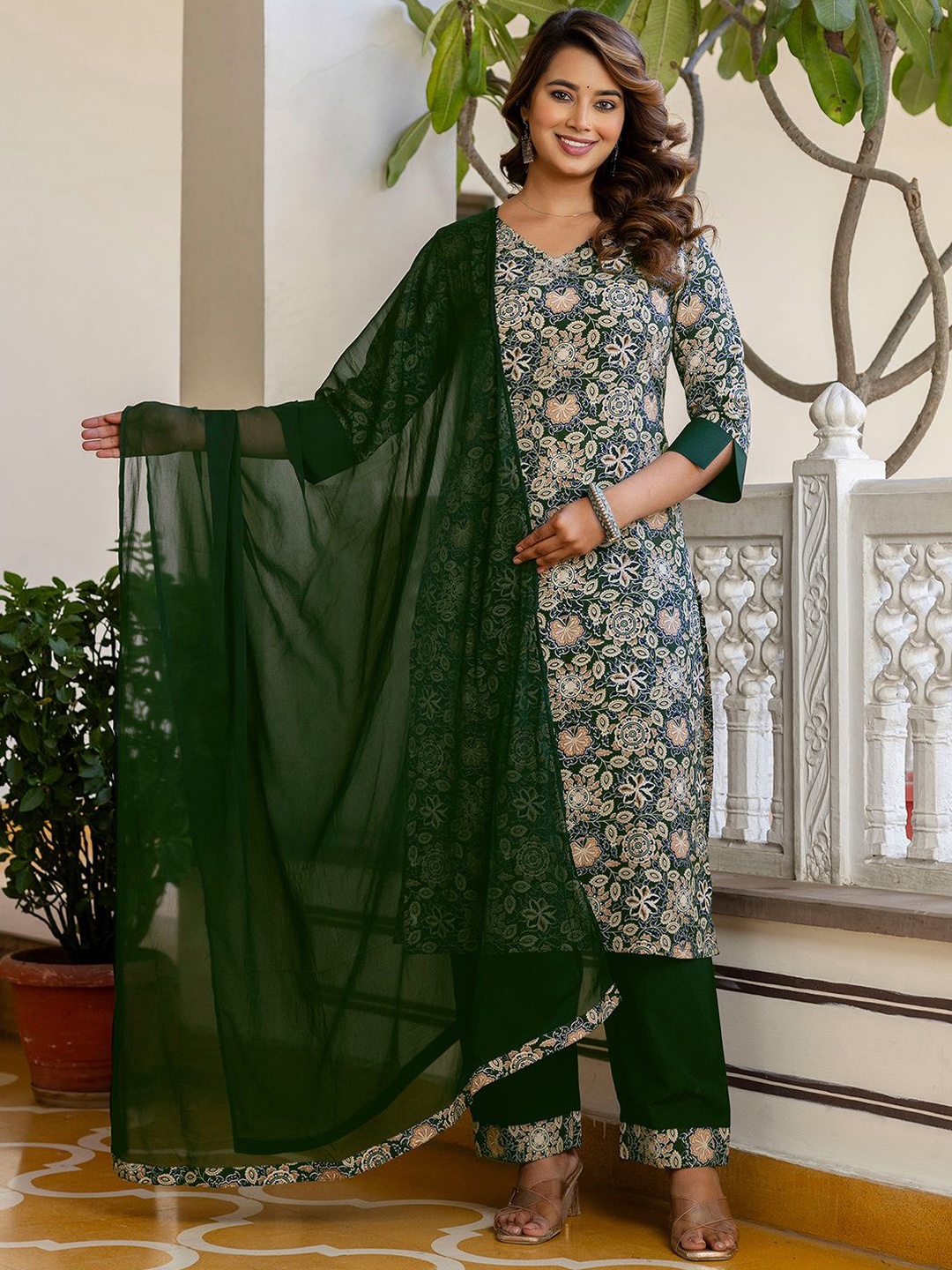 

KALINI Floral Printed V Neck Straight Kurta With Trousers & Dupatta, Green