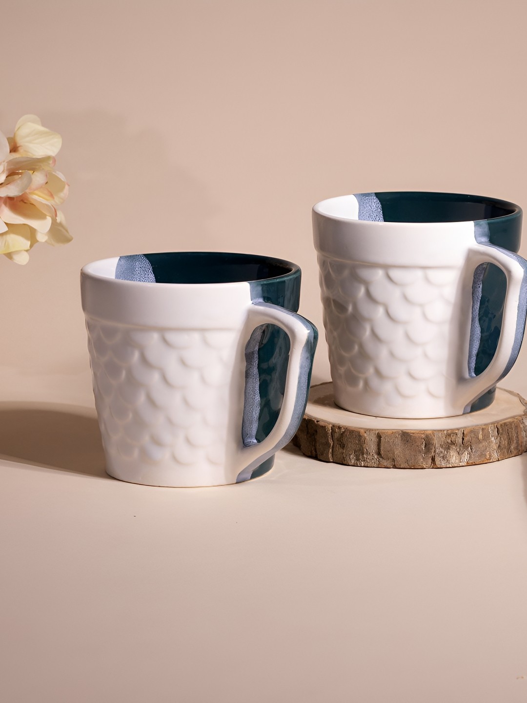 

Storepedia White & Blue 2 Pieces Textured Ceramic Glossy Cups-150 ml Each