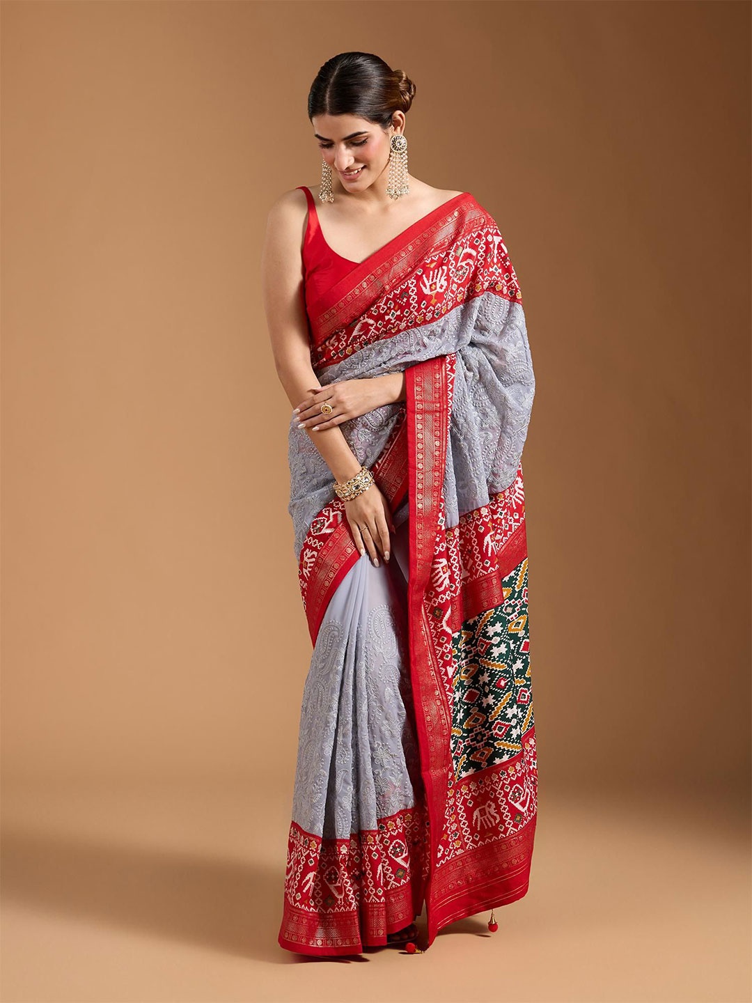 

Moda Rapido Ethnic Motifs Zari Pure Georgette Patola Saree, Grey