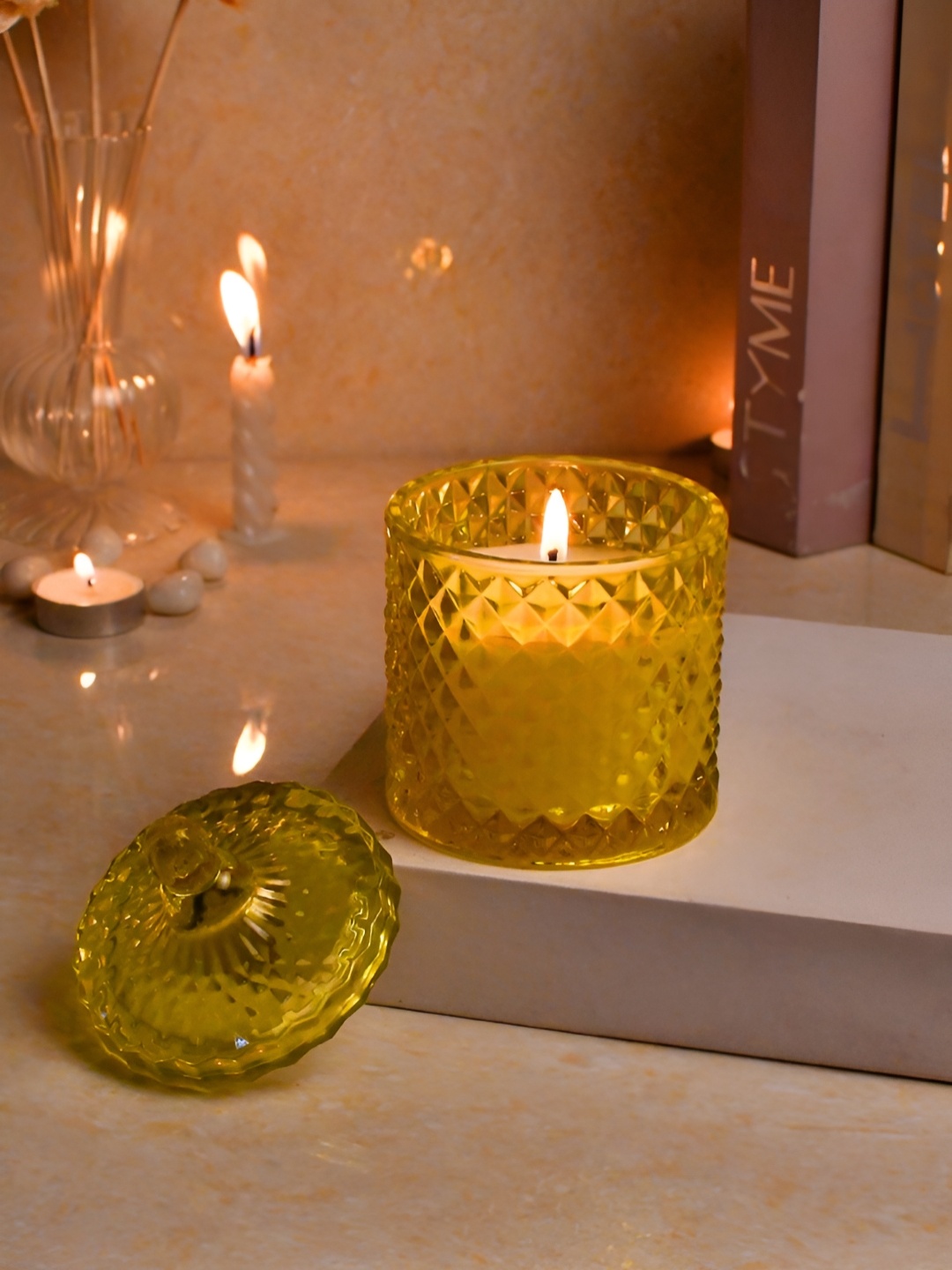 

Myntra Elegant Homes Yellow 1 pieces Jar Candle