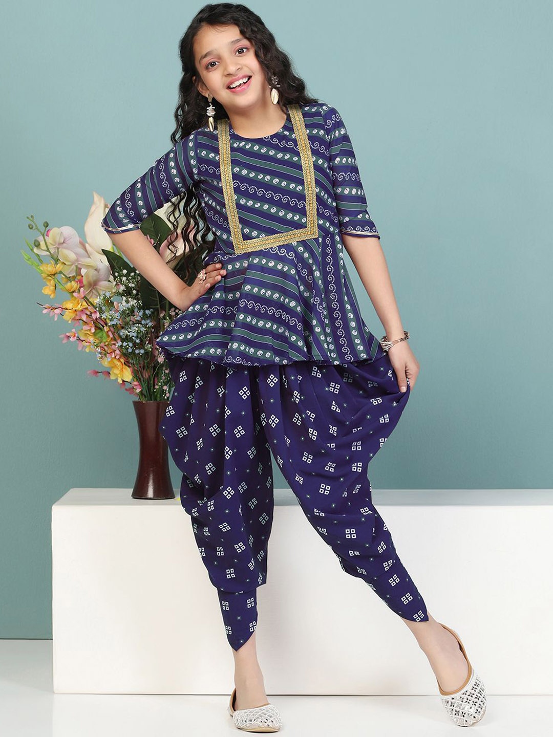 

Sangria Navy Blue Bandhani Printed Round Neck Georgette A-Line Kurti With Dhoti Pants