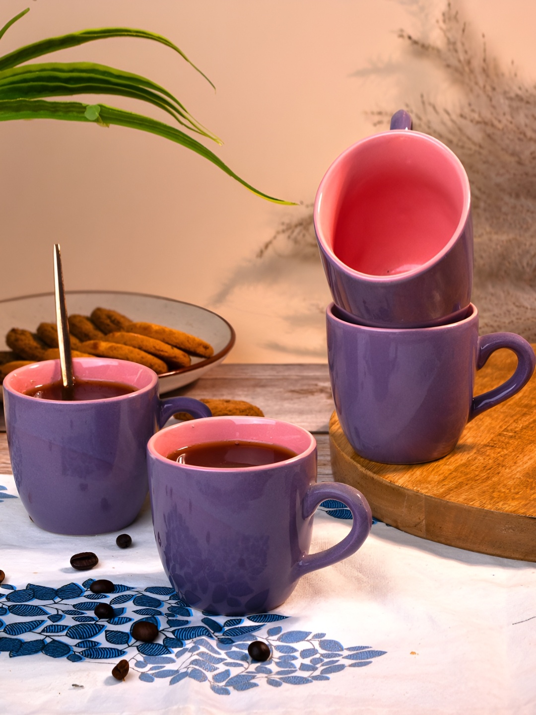 

Storepedia Purple & Peach-Coloured 4 Pieces Ceramic Glossy Cups 150 ml Each