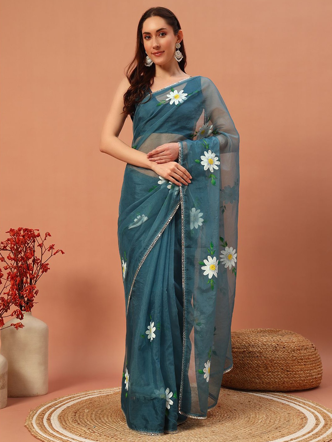 

Meeranshi Floral Printed Embellished Organza Saree, Blue