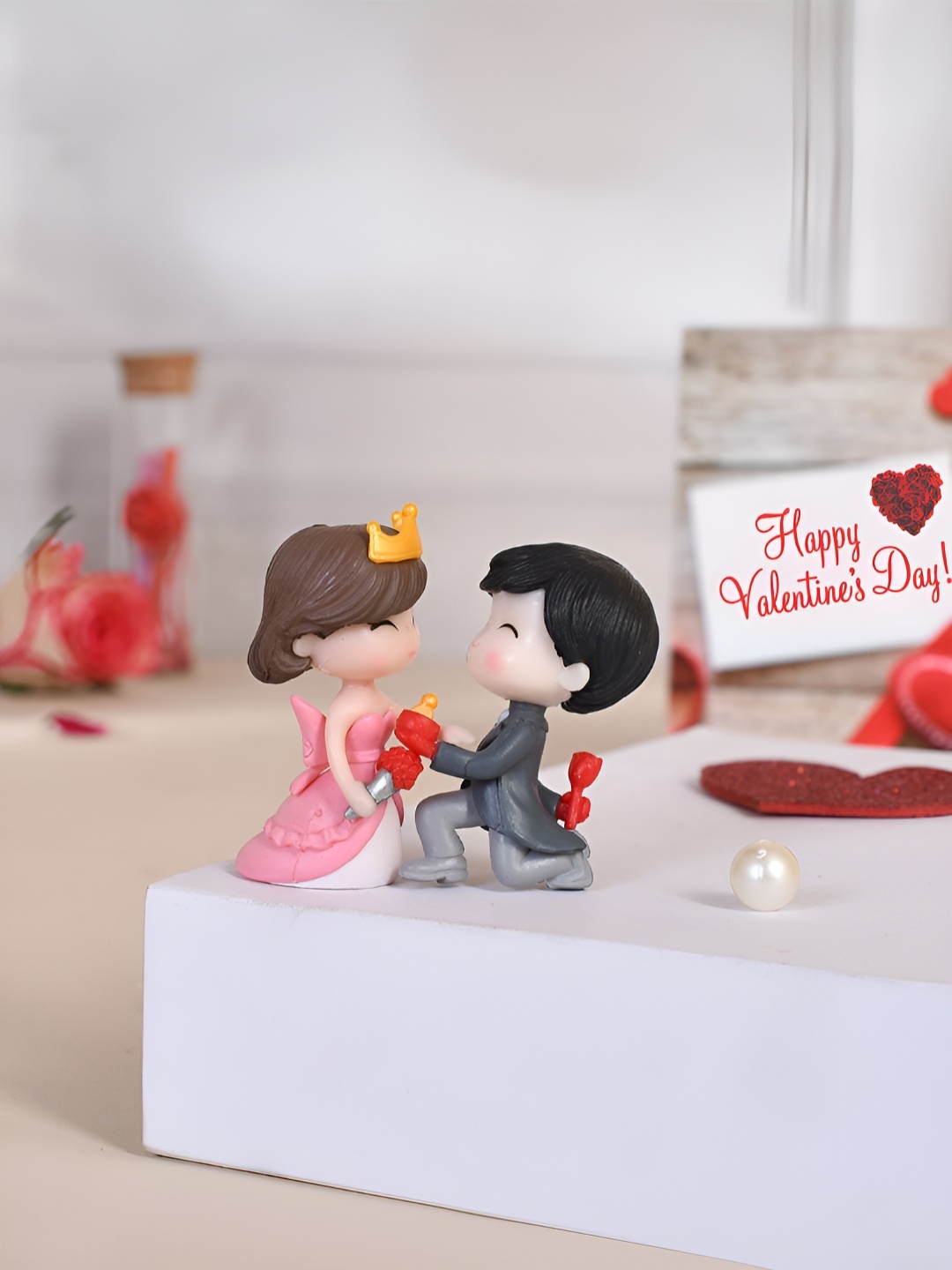

Myntra Elegant Homes Grey Forever Yours Proposal Figurine Showpiece