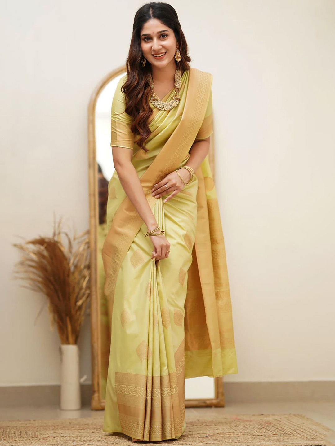 

Anjaneya Sarees Woven Design Zari Silk Blend Banarasi Saree, Yellow