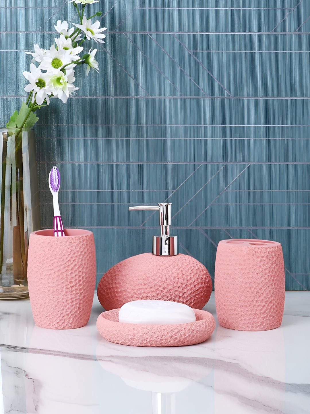 

Myntra Elegant Homes Peach 4 Pieces Honey Comb Shaped Matte Resin Bath Accessories Set