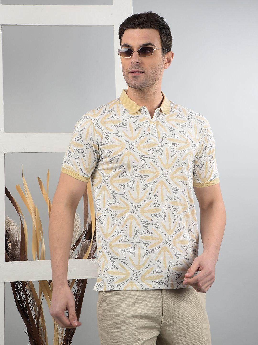 

Crimsoune Club Men Abstract Printed Polo Collar Cotton Slim Fit T-shirt, Beige