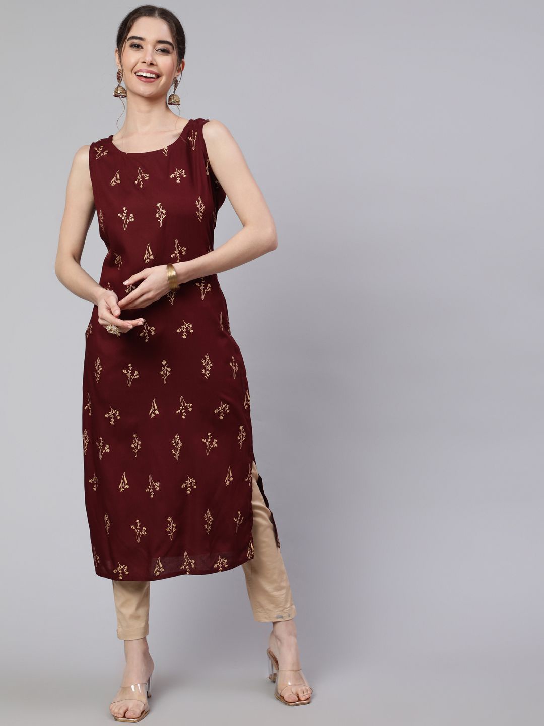 

Viharini Floral Printed Sleeveless Round Neck Straight Kurta, Maroon
