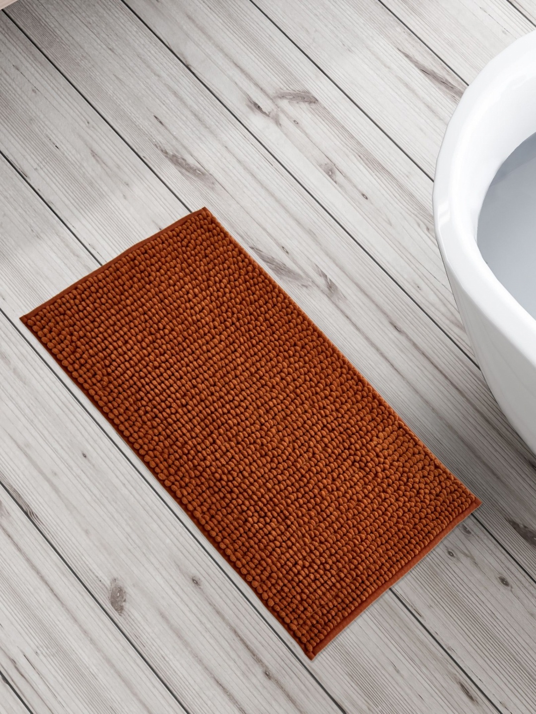 

Home Centre Brown Textured 150 GSM Anti-Slip Bath Rug