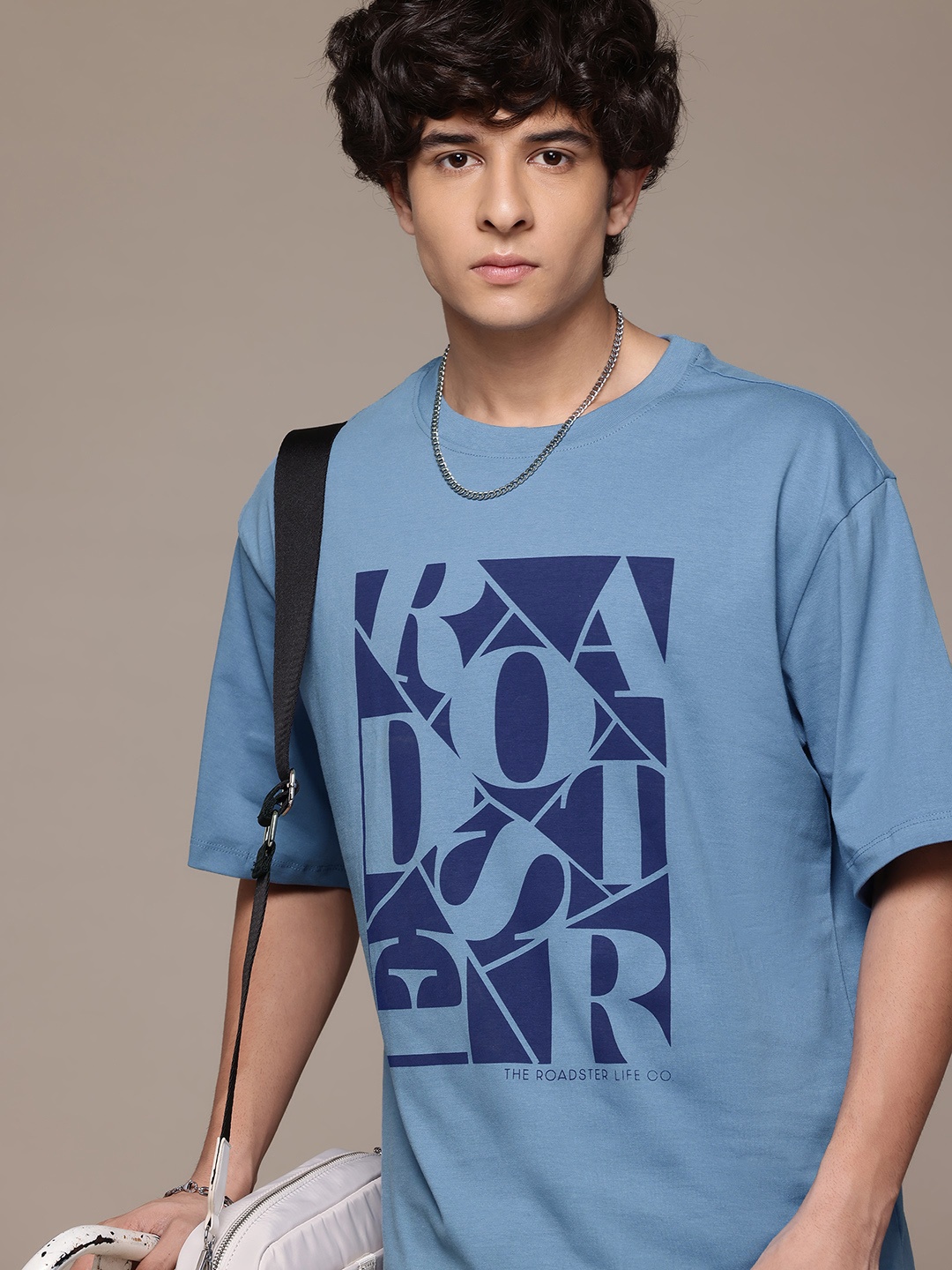 

Roadster The Lifestyle Co Brand Logo Printed Drop-Shoulder Sleeves Pure Cotton T-shirt, Blue