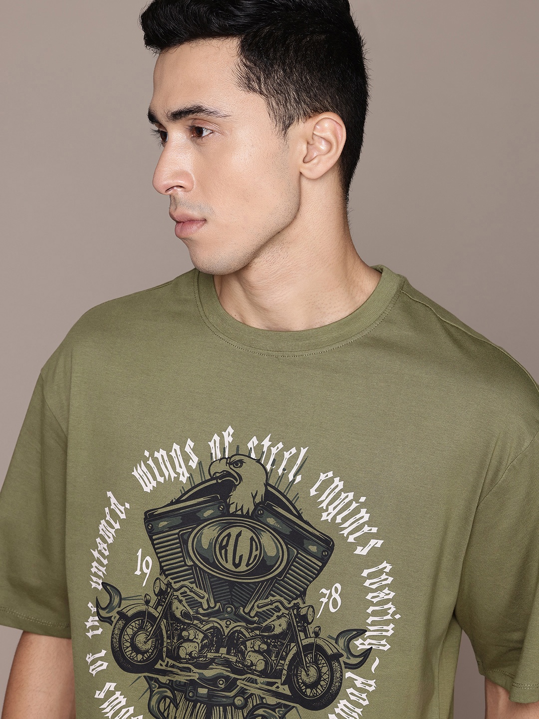 

The Roadster Lifestyle Co. Printed Drop-Shoulder Sleeves Pure Cotton Relaxed T-shirt, Olive