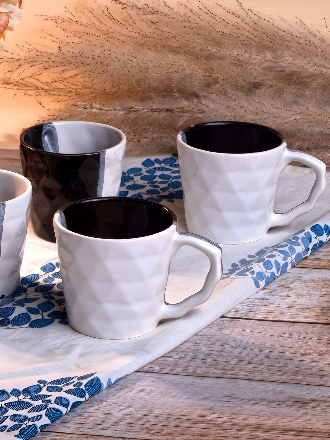 

Storepedia White & Black Handcrafted Solid Ceramic Glossy Cups Set of Cups and Mugs