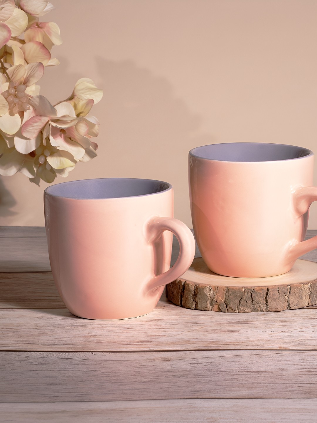 

Storepedia Peach-Coloured and Grey 2 Pieces Ceramic Glossy Cups 150 ml Each