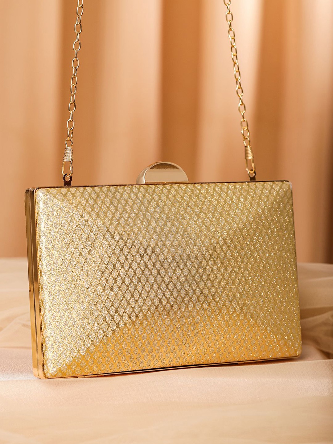 

Rubans 24K Gold Shimmery Glossy Box Clutch with Luxe Textured Finish & Chain