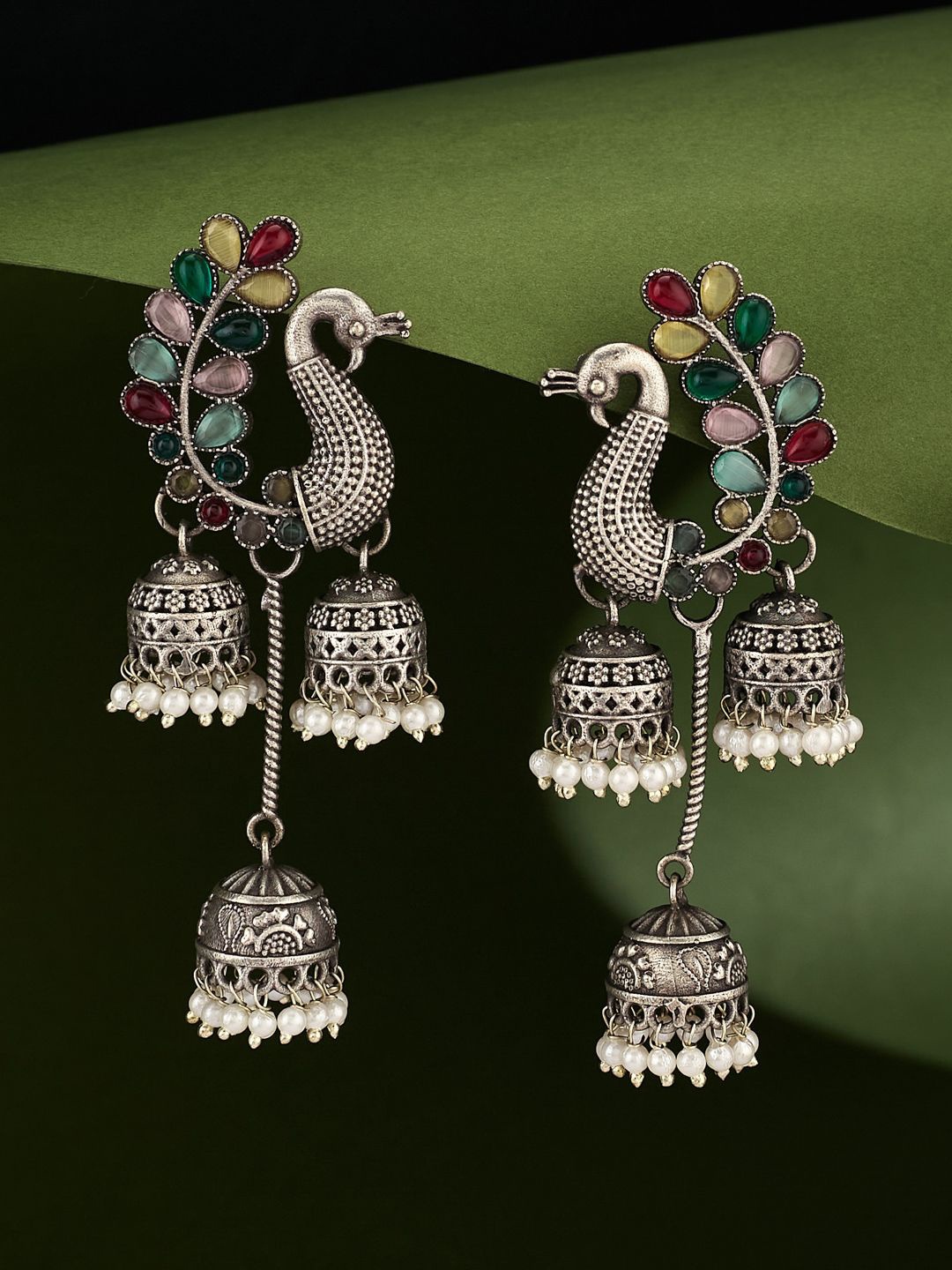 

ATIBELLE German Silver-Plated Artificial Stones Studded Peacock Shaped Jhumkas