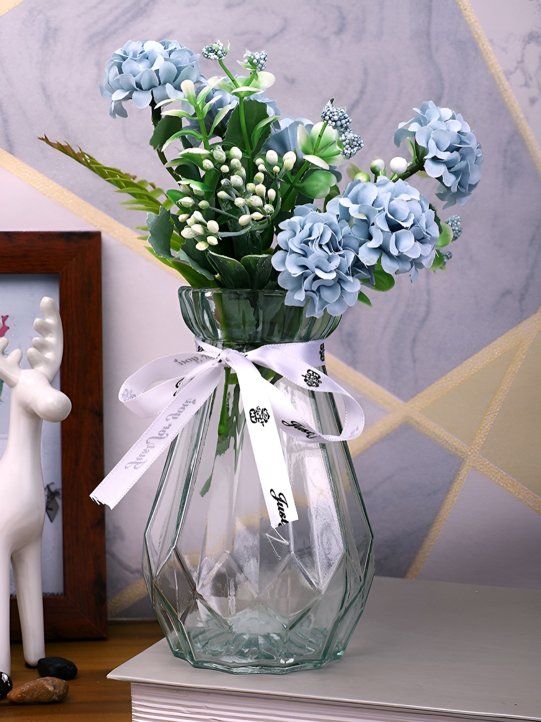 

Myntra Elegant Homes Transparent Textured Glass Flower Vases