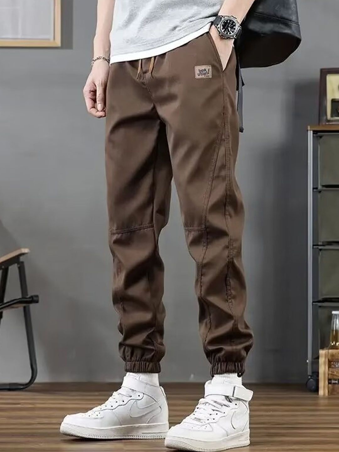 

StyleCast Men Solid Regular Fit Mid Rise Drawstring Closure Joggers, Brown