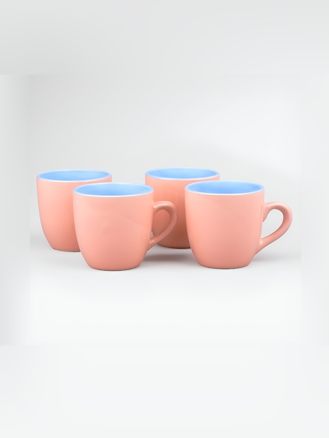 

Storepedia Peach-Coloured & Blue 4 Pieces Glossy Ceramic Tea Cups 150ml Each