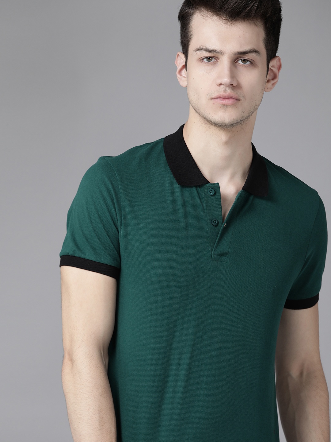 

Roadster Men Teal Green Solid Polo Collar T-shirt