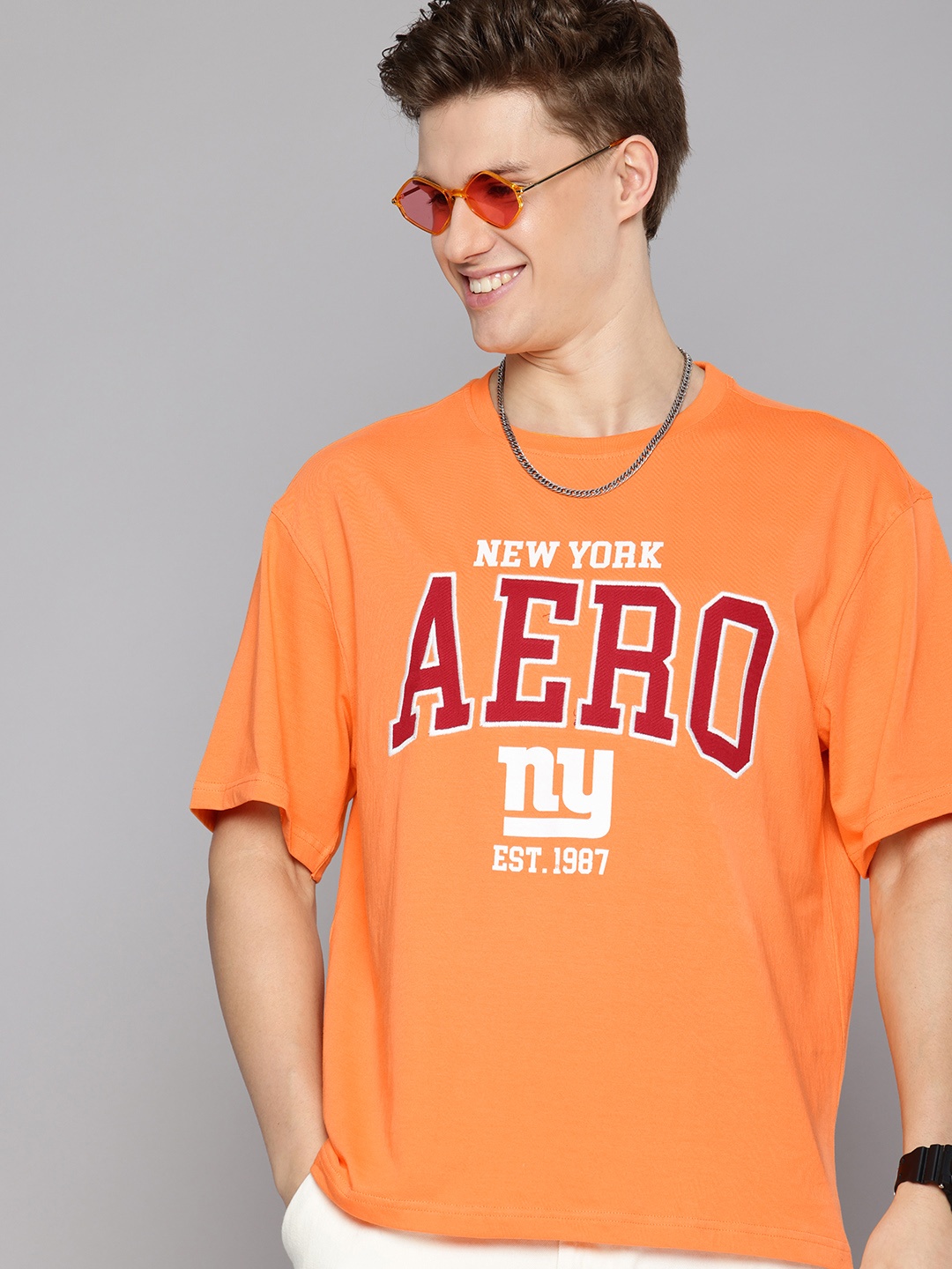 

Aeropostale Printed Applique Detail Drop-Shoulder Sleeves Pure Cotton Relaxed Fit T-shirt, Orange