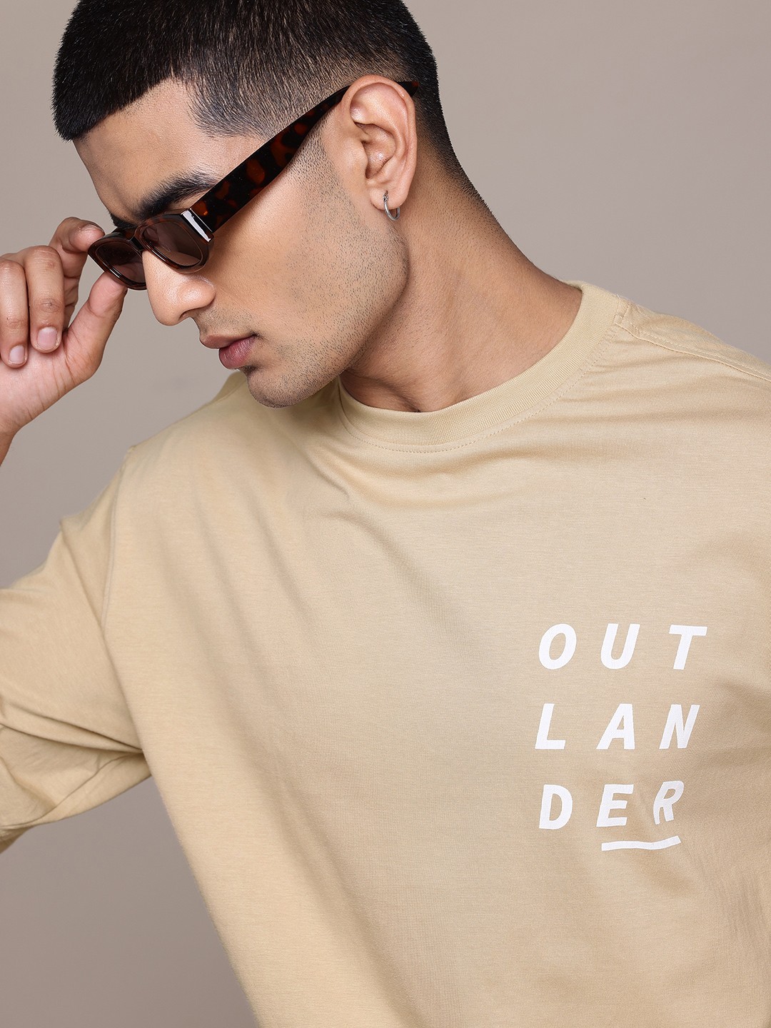 

The Roadster Lifestyle Co. Printed Drop-Shoulder Sleeves Pure Cotton Relaxed Fit T-Shirt, Beige