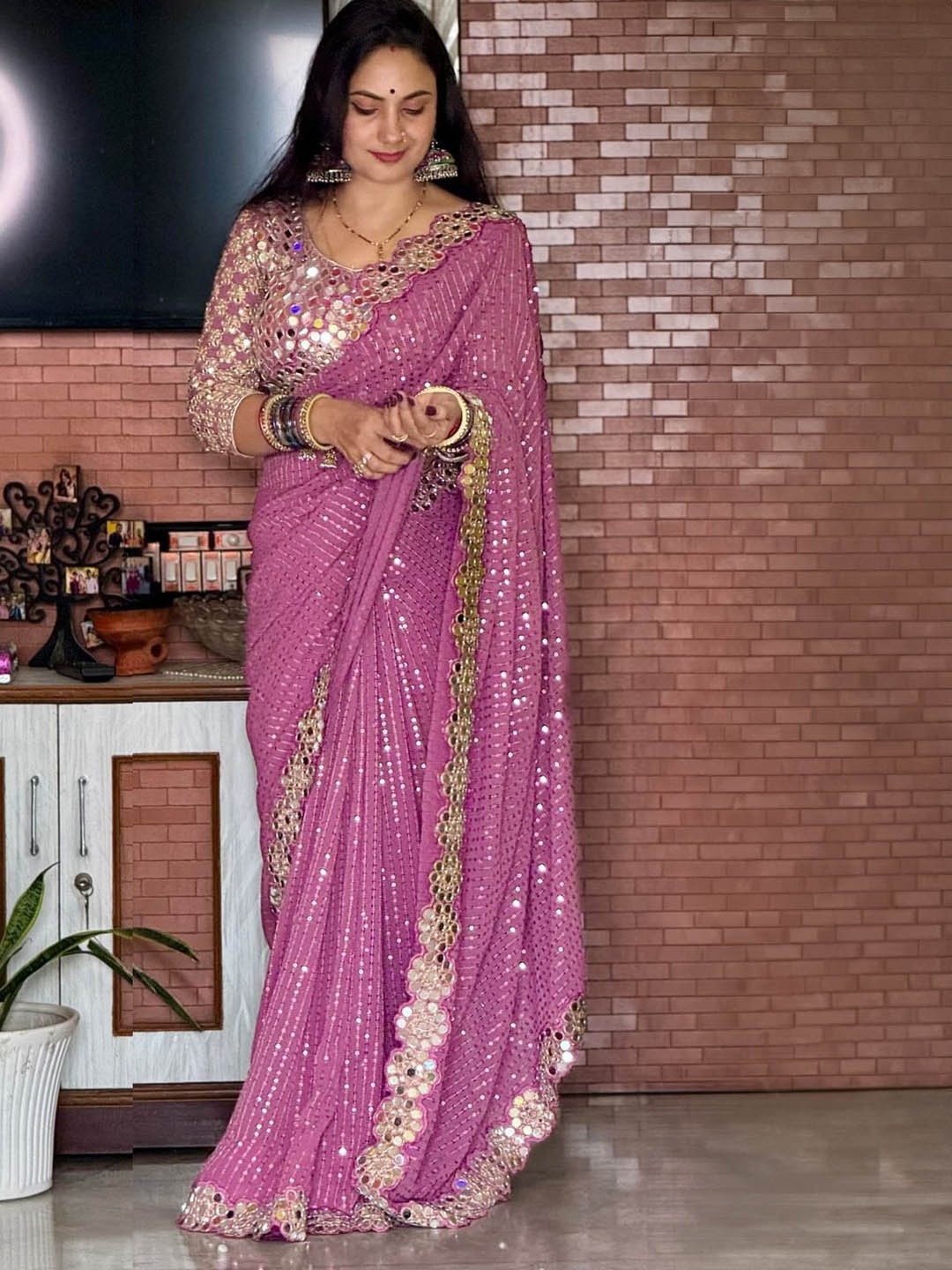 

Celeb Styles Embellished Mirror Work Pure Georgette Saree, Pink