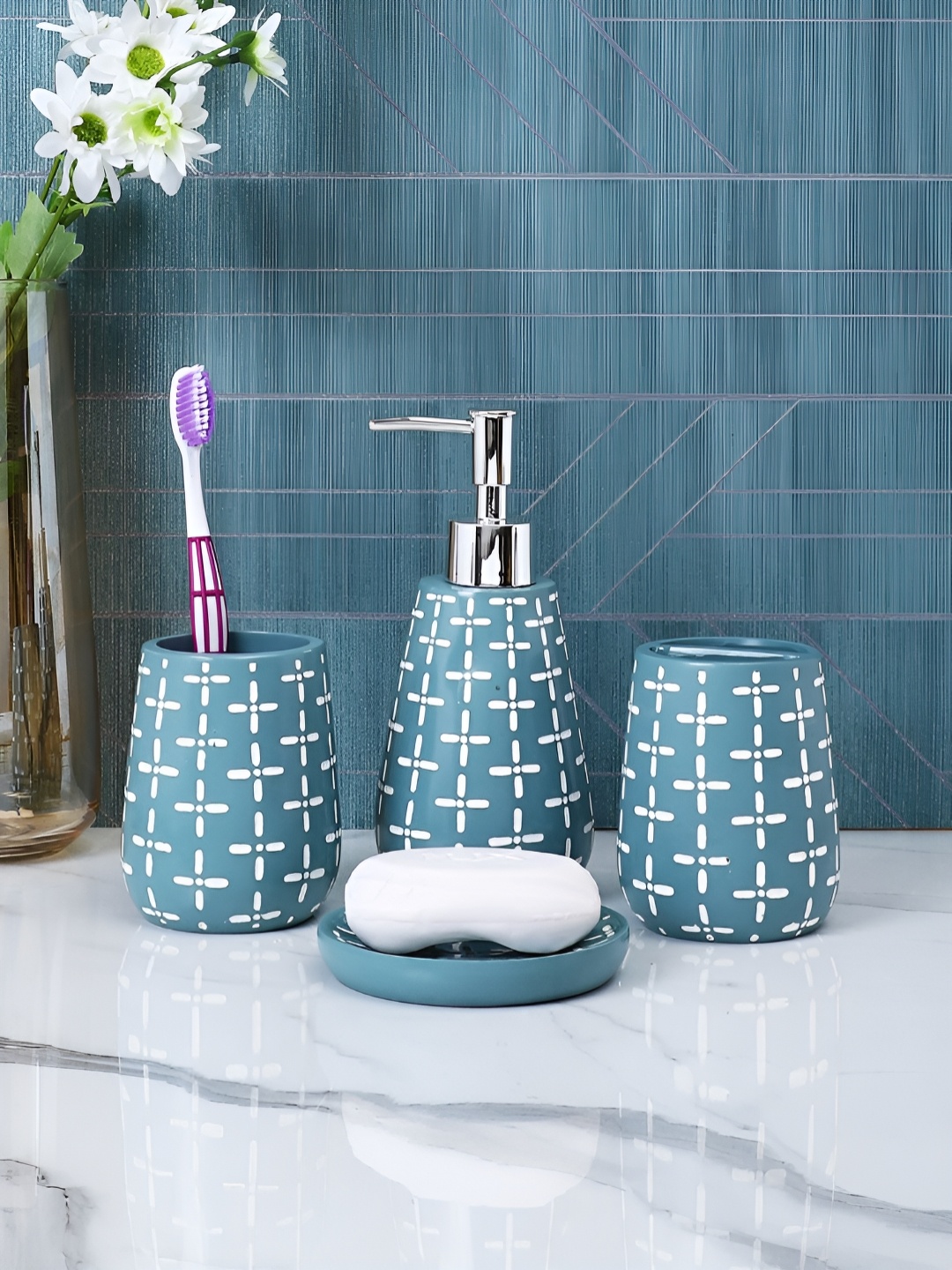 

Myntra Elegant Homes Teal & White 4 piece Geometric Resin Bath Accessories Set